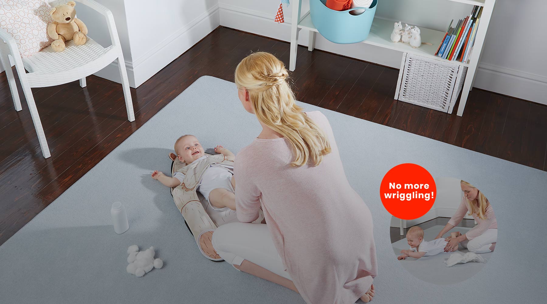 Anti roll changing mat The Wriggler being used by mother for a toddler nappy change
